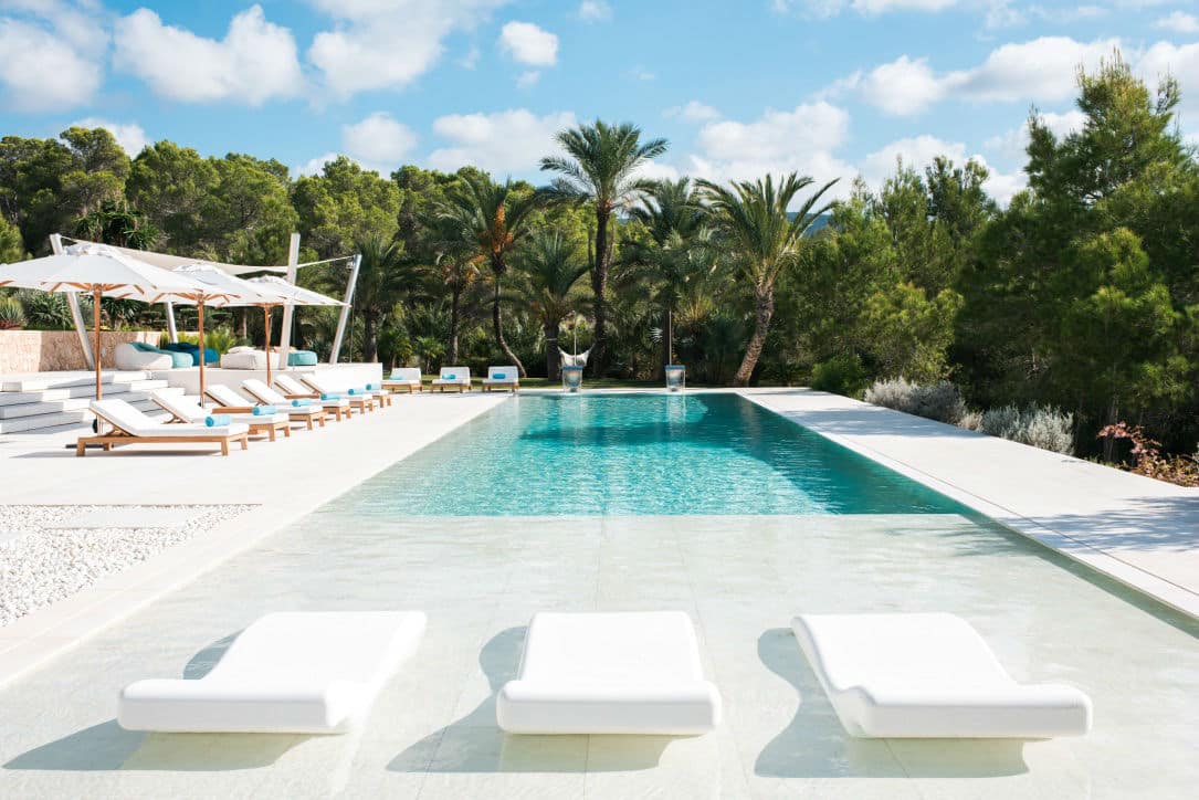 Villa Casa Acqua Ibiza Pool and loungers surrounded by trees - private villa